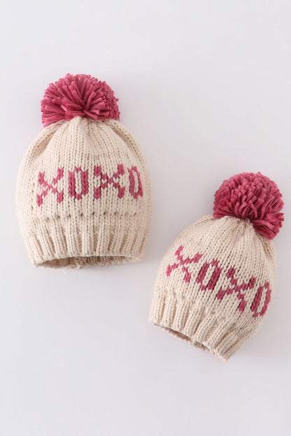 Cream XOXO Knit Pom Pom Beanie