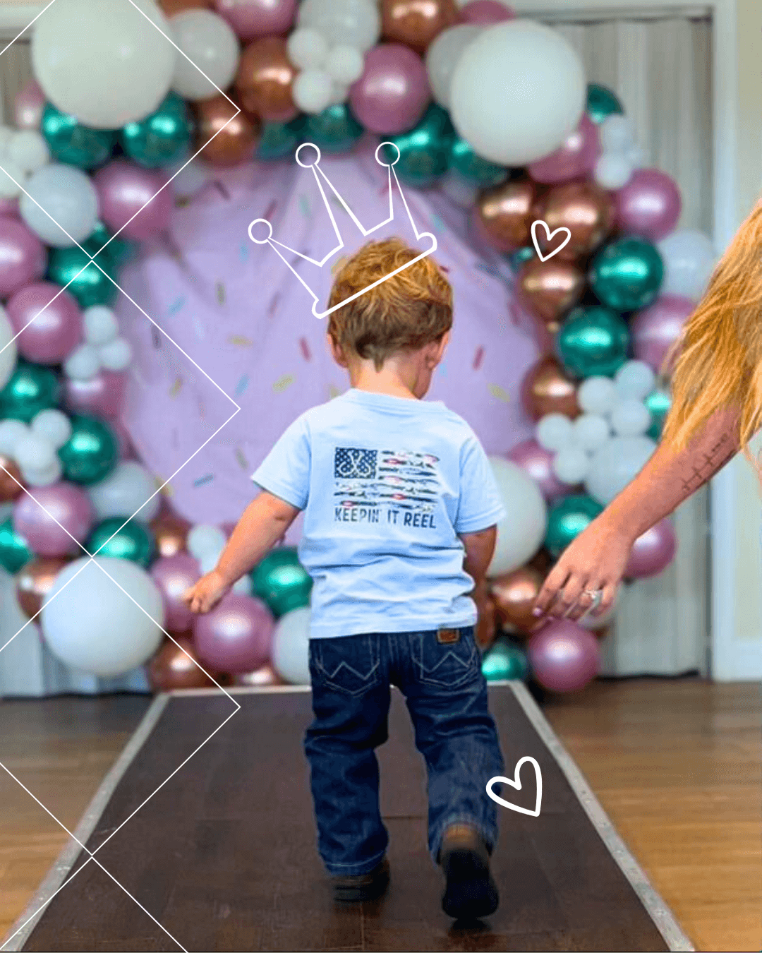 little boy walking in blue jeans